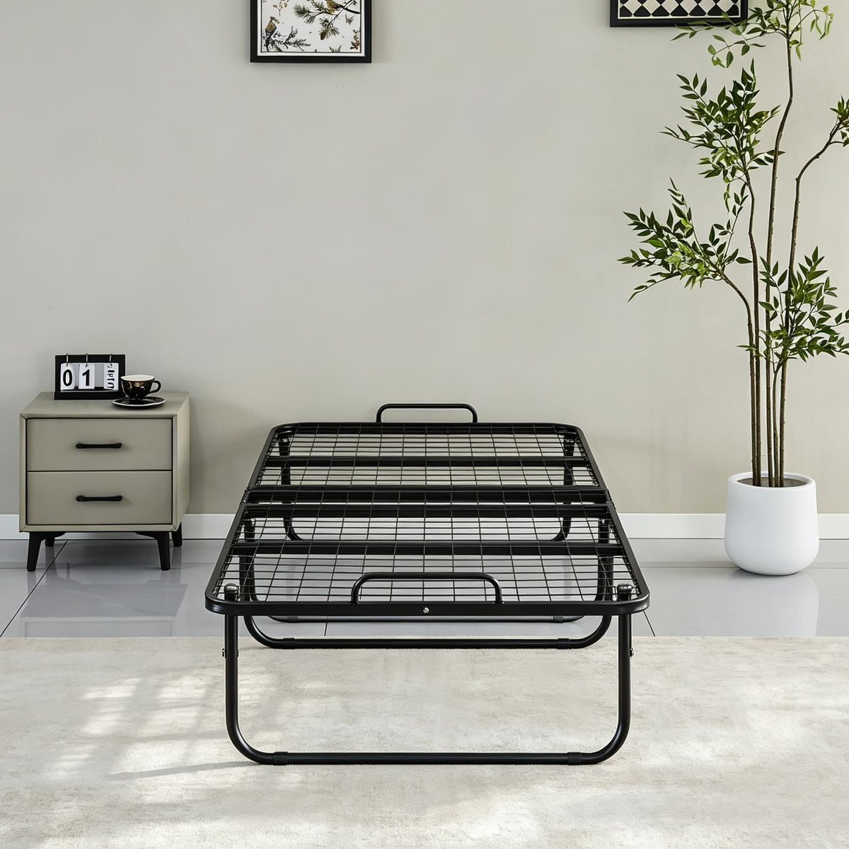 Folding bed with mattress